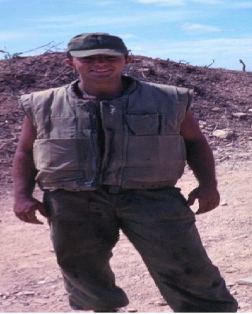 Tom wearing a Marine flak jacket in South Vietnam.