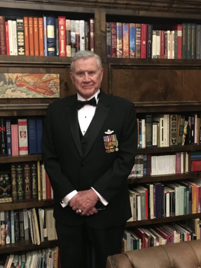 Colonel Hank Hoffman in a tuxedo with military ribbons