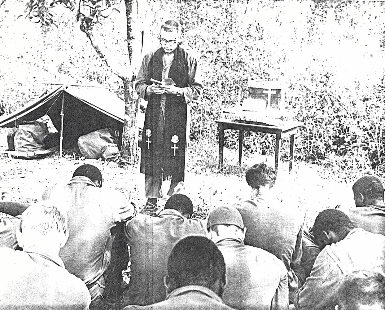 Military chaplain holding a service