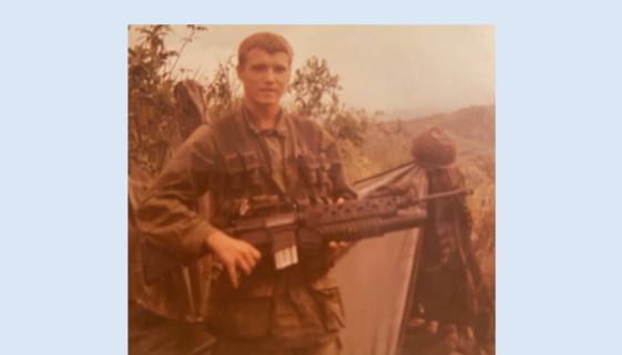 Army soldier in uniform carrying a rifle