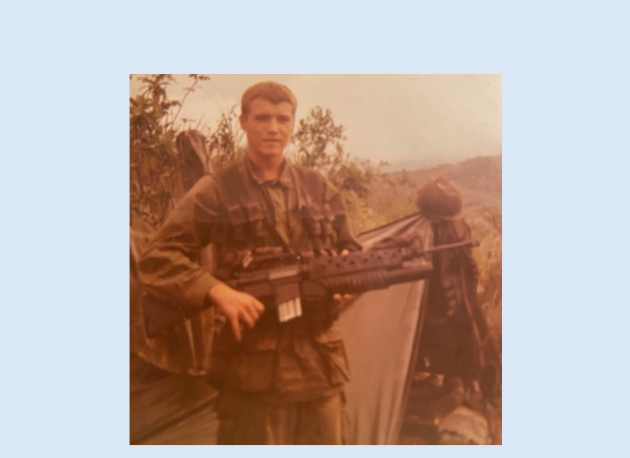 Army soldier in uniform carrying a rifle