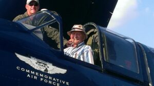 Joe Dwigans sitting in the cockpit of a Commemorative Air Force SB2C Helldiver
