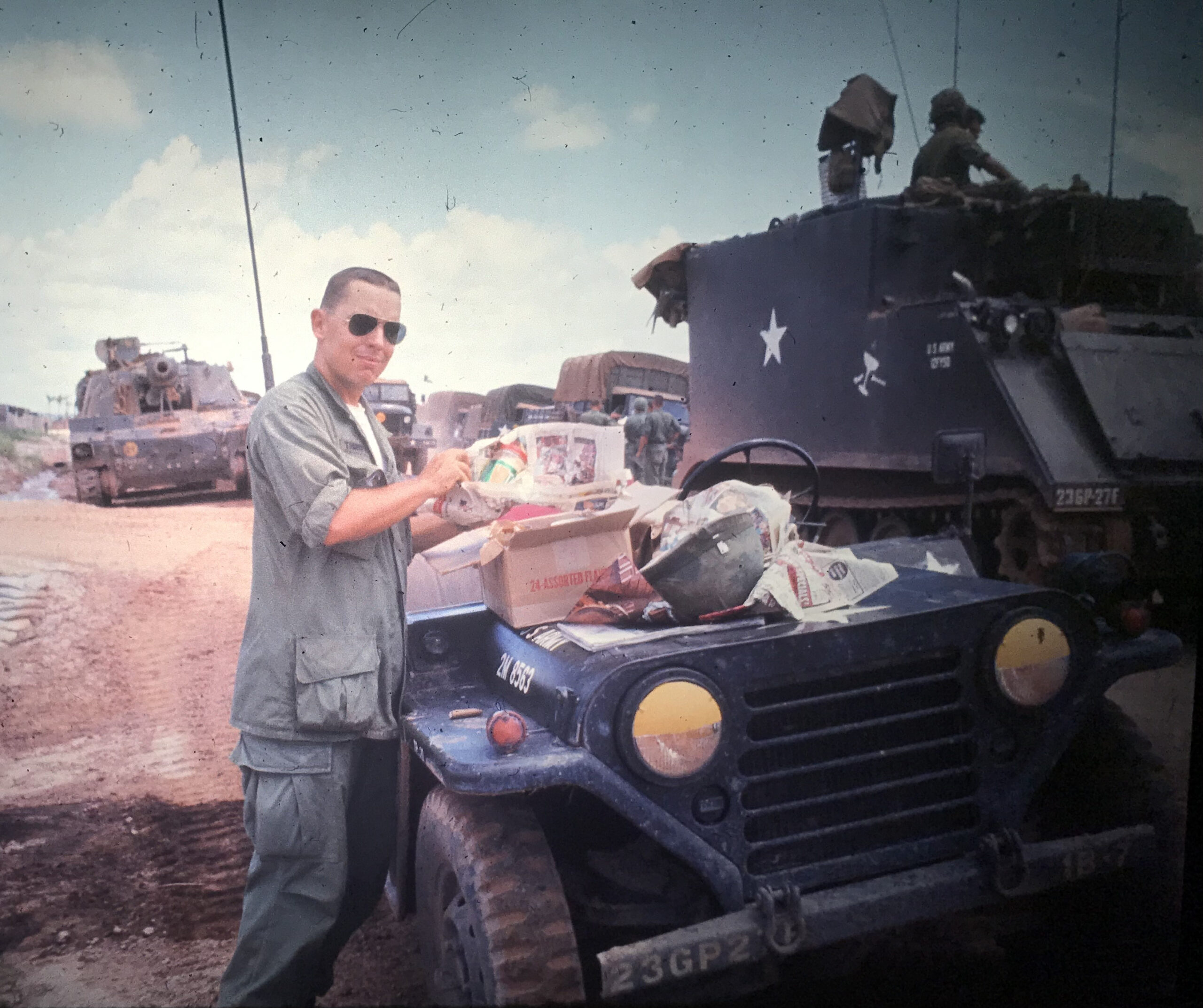 Army 1st lieutenant next to a jeep in Vietnam in 1967