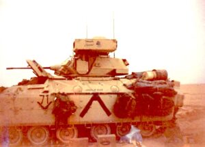 A Bradley Fighting Vehicle with raised TOW launcher