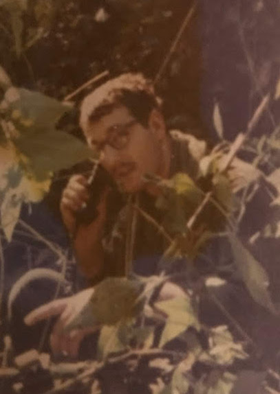 Soldier talking on the radio in the jungle