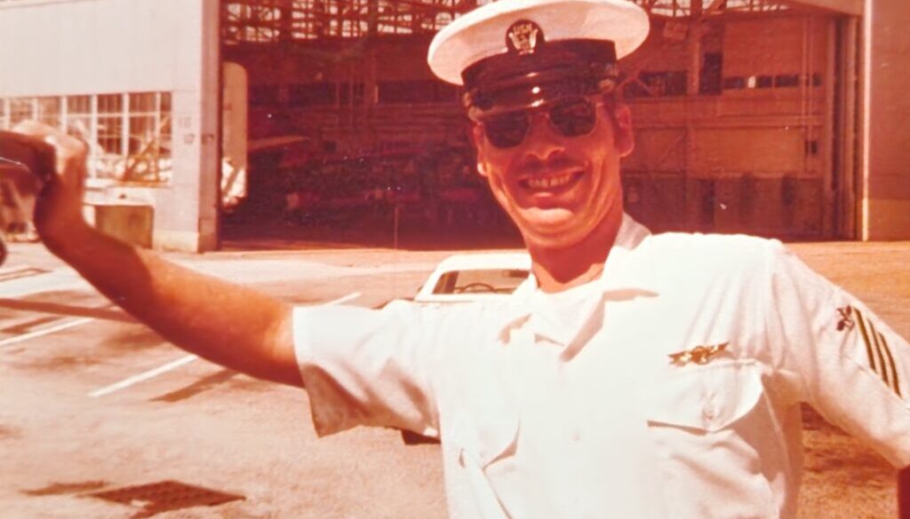 U.S. Navy airman in his summer white uniform.