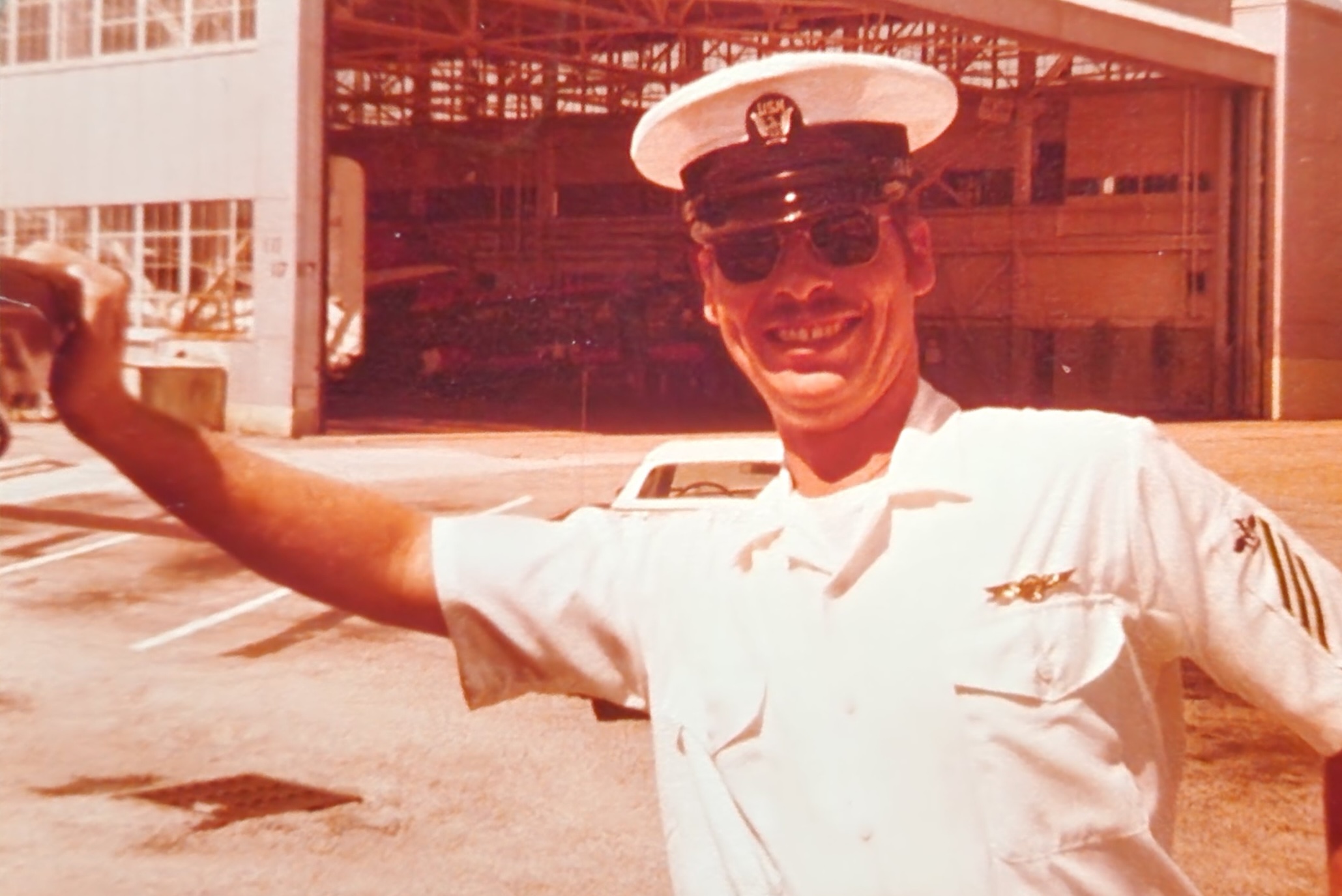 U.S. Navy airman in his summer white uniform.