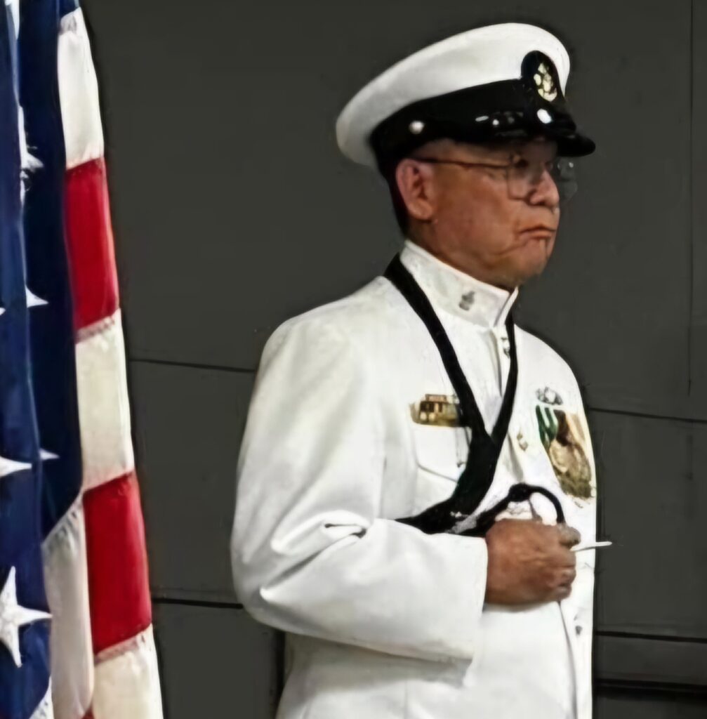 A retired Navy Chief Boatswain's Mate in uniform.