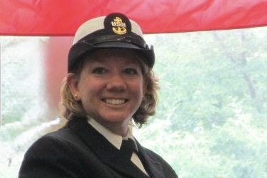 Chief Ramlow at retirement - featured image 2 Female chief petty officer in dress blue uniform and cover