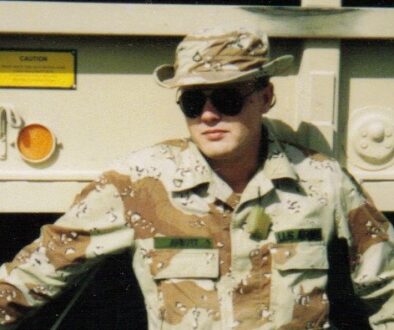Dale Abbot standing next to a truck - featured image