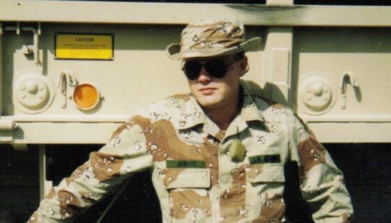 Dale Abbot standing next to a truck - featured image