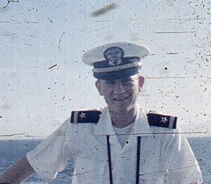 Grainy photo of male Navy ensign in summer whites