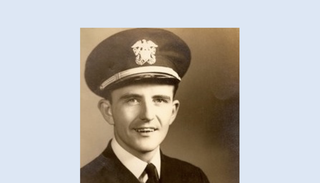 World War II Naval Officer in dress blue uniform.