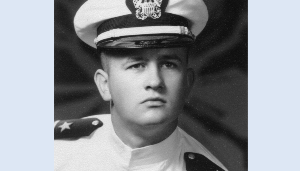 Head shot of Male Navy LTjg in Choker White Uniform