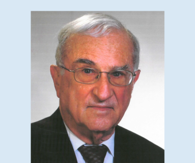 Headshot of a man wearing a business suit