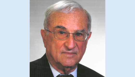 Headshot of a man wearing a business suit