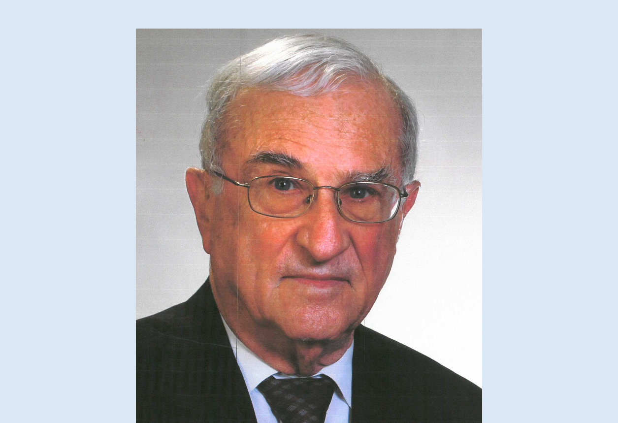 Headshot of a man wearing a business suit