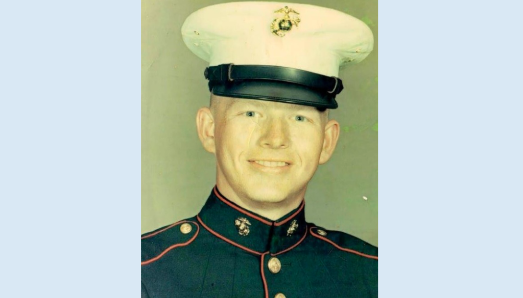 Headshot of male Marine in dress uniform.