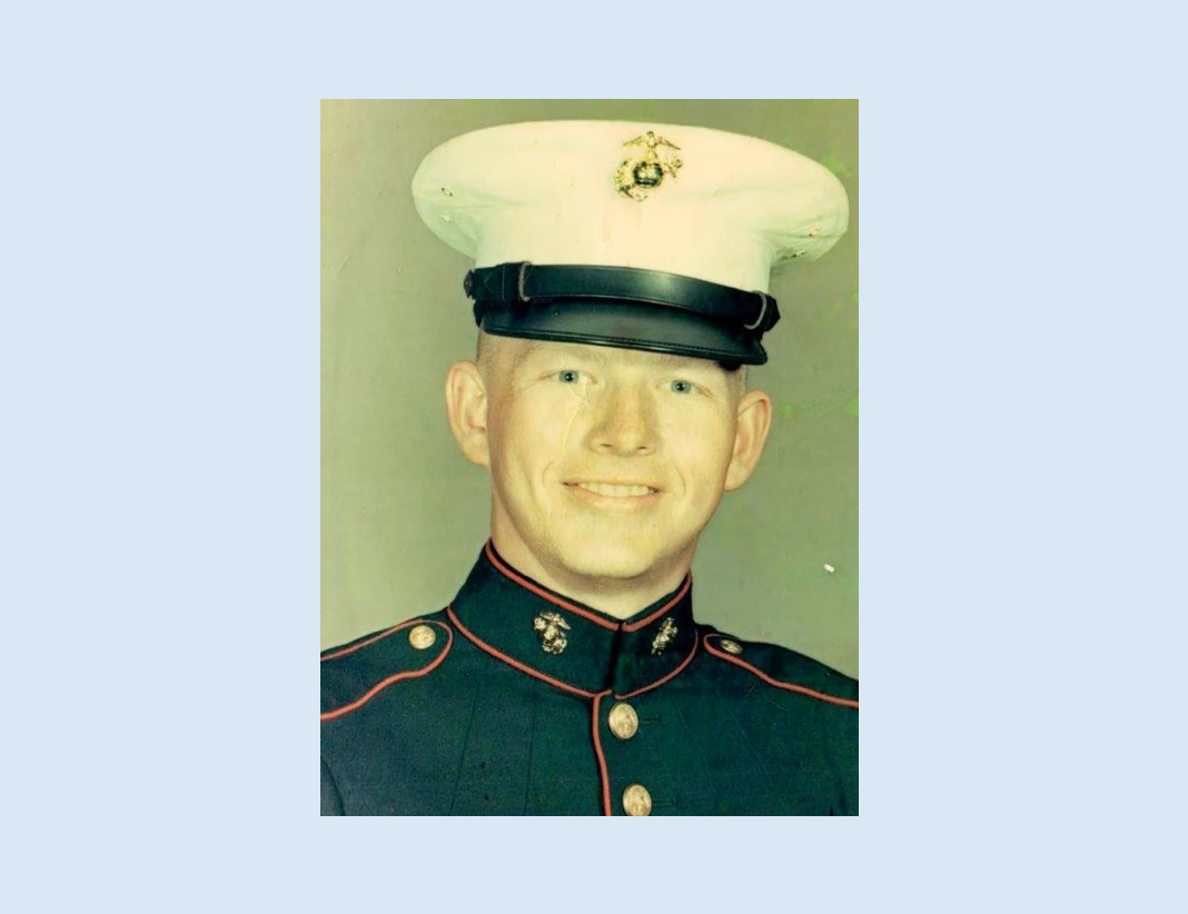 Headshot of male Marine in dress uniform.